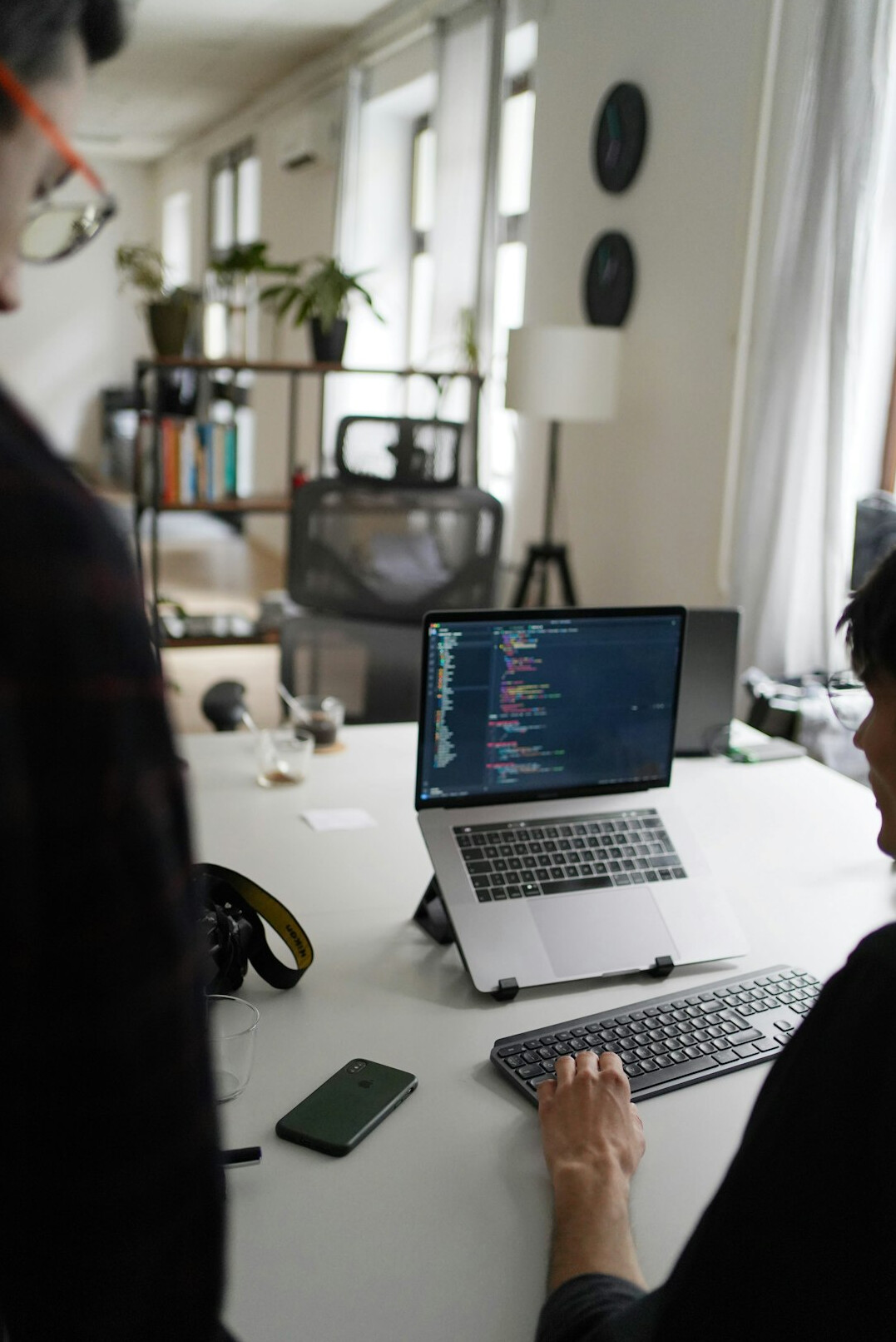programmers coding in office