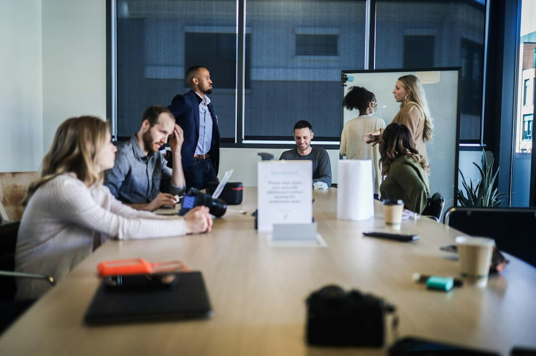business team discussing software