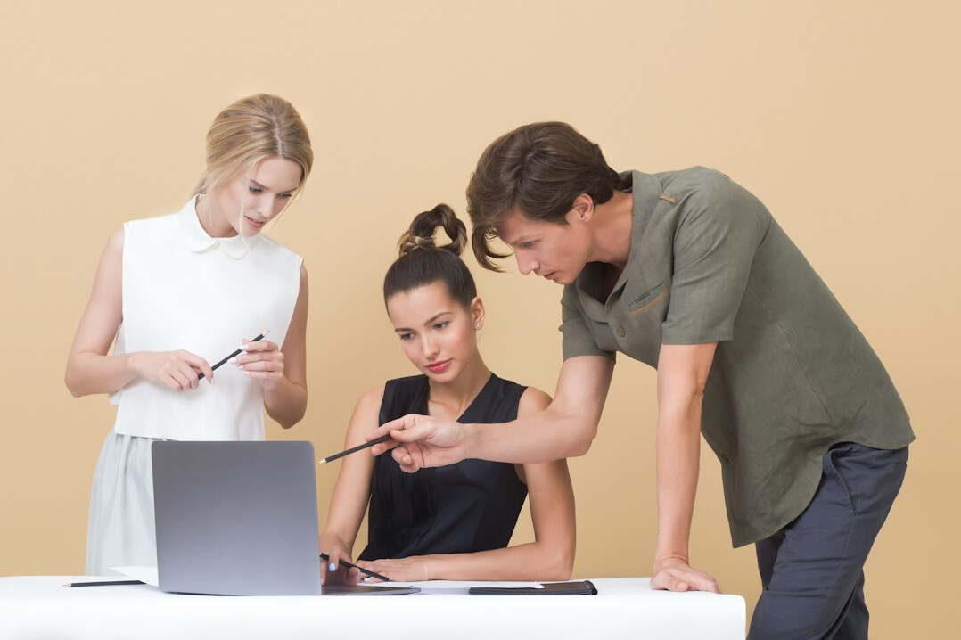 team reviewing business reports